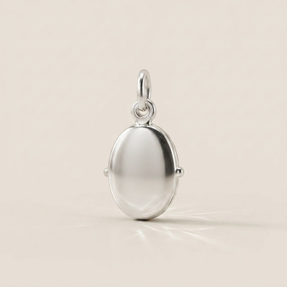 Dije Relicario en Oro Blanco 14K