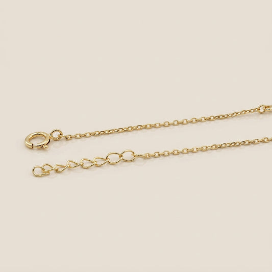 Pulsera Ojo y Cruz con Circonias en Oro Amarillo de 14K