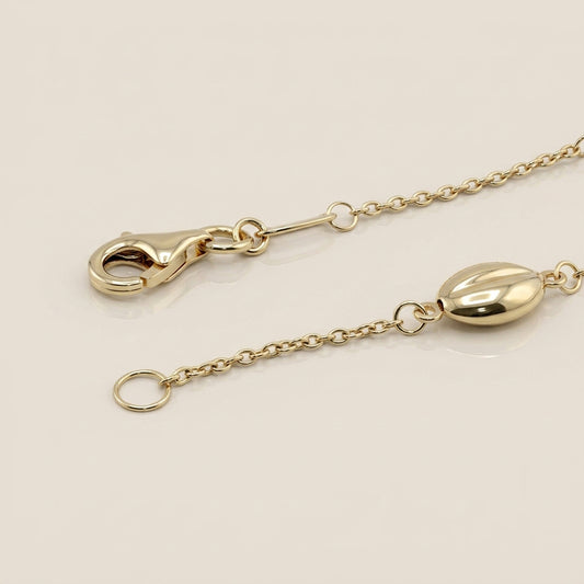 Pulsera Granos de Café en Oro Amarillo y Blanco de 14K