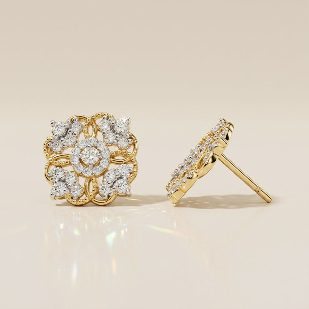 Aretes Estilo Flor con Diamantes con 0.68 CTS Total en Oro Amarillo de 14K