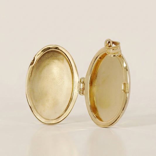 Dije Relicario Oval en Oro Amarillo de 10K