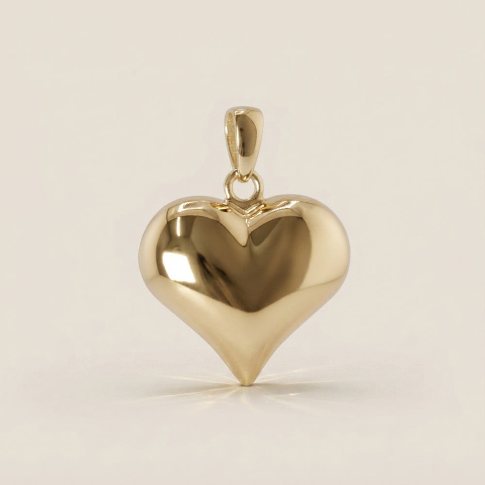 Dije Corazón Hueco en Oro Amarillo de 14K