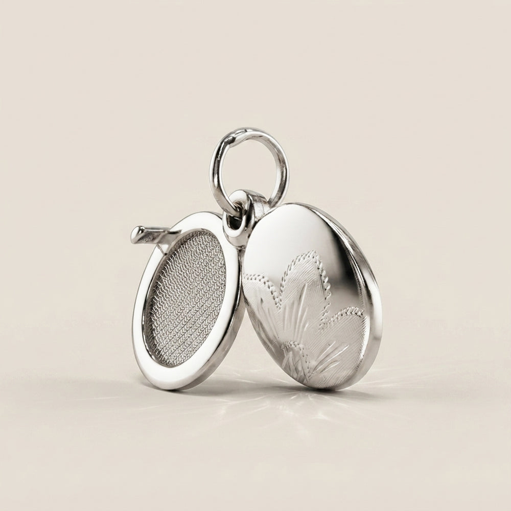 Dije Relicario en Oro Blanco 14K