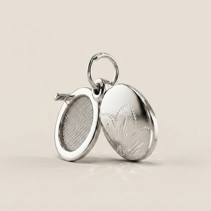 Dije Relicario en Oro Blanco 14K