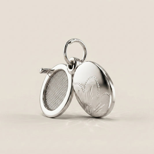 Dije Relicario en Oro Blanco 14K