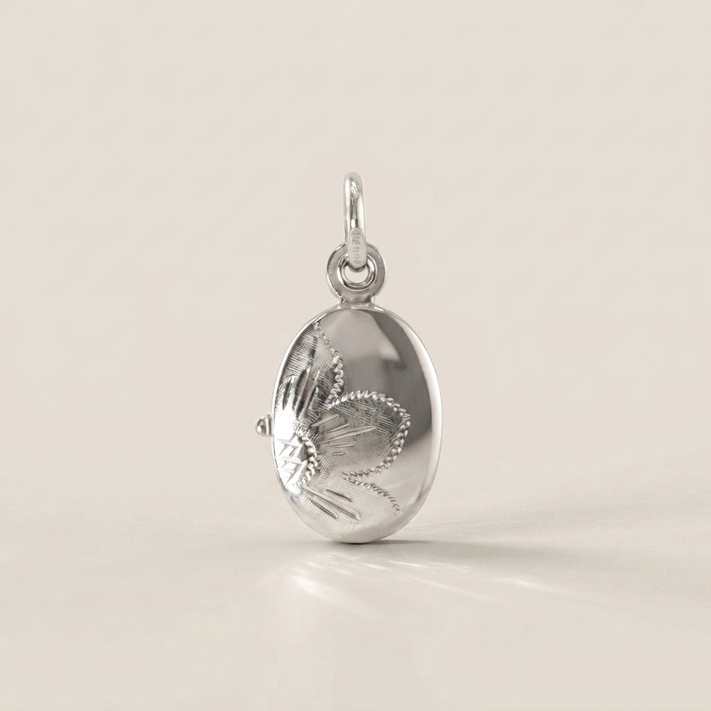 Dije Relicario en Oro Blanco 14K