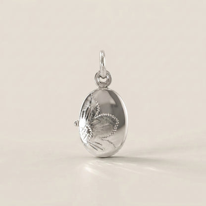 Dije Relicario en Oro Blanco 14K