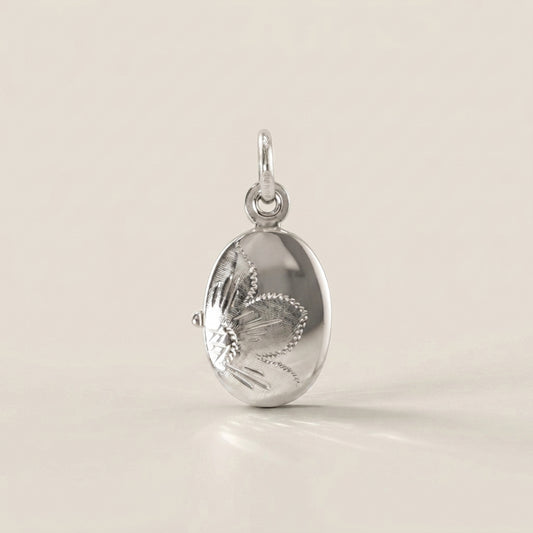 Dije Relicario en Oro Blanco 14K