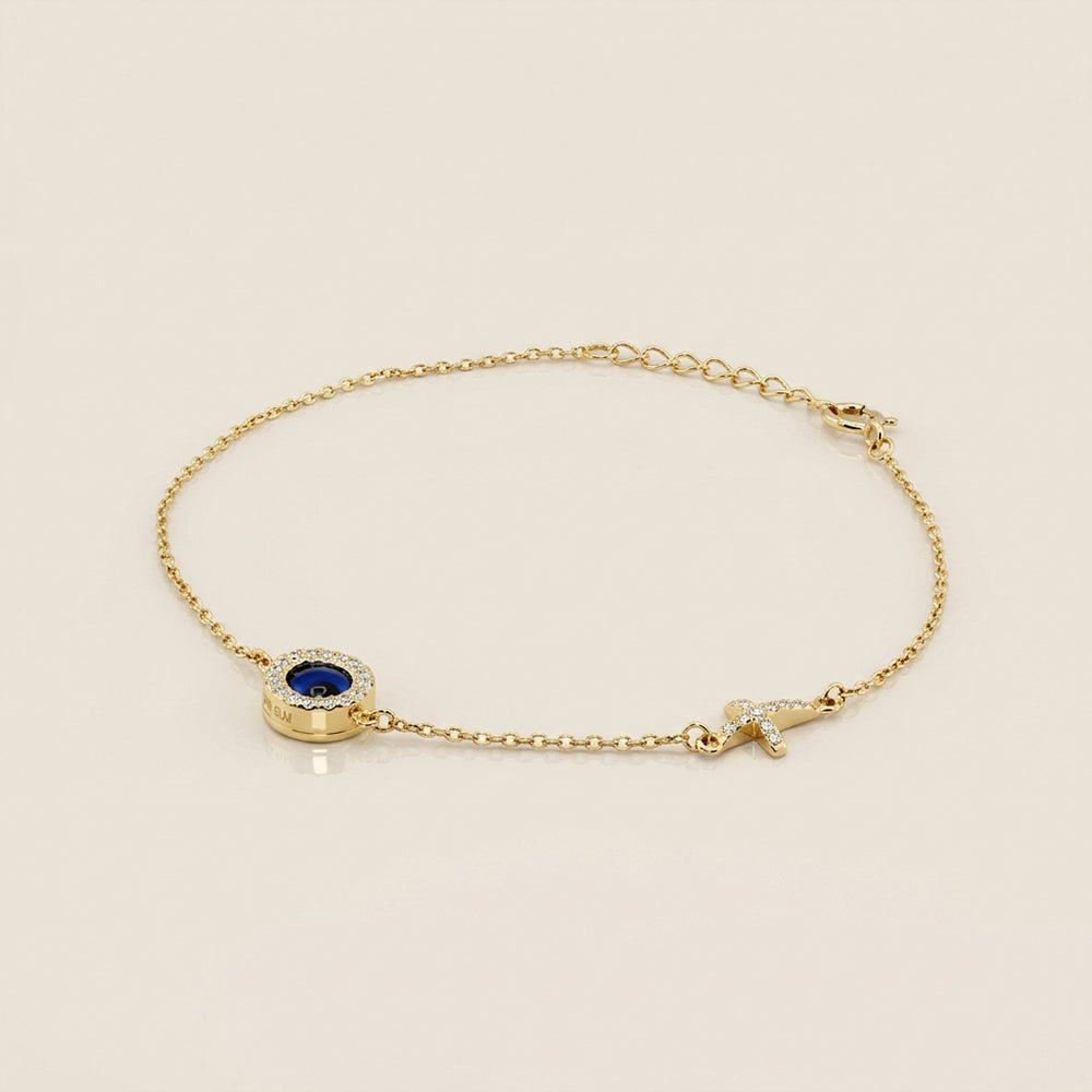 Pulsera Ojo y Cruz con Circonias en Oro Amarillo de 14K