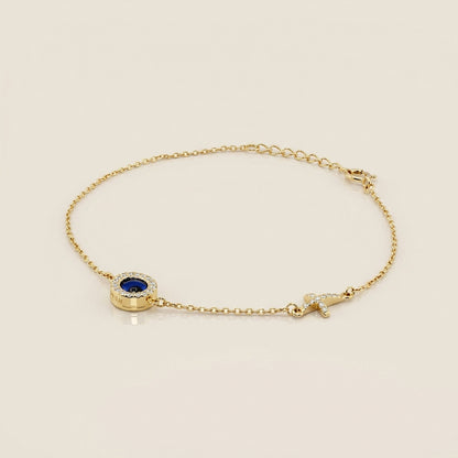 Pulsera Ojo y Cruz con Circonias en Oro Amarillo de 14K