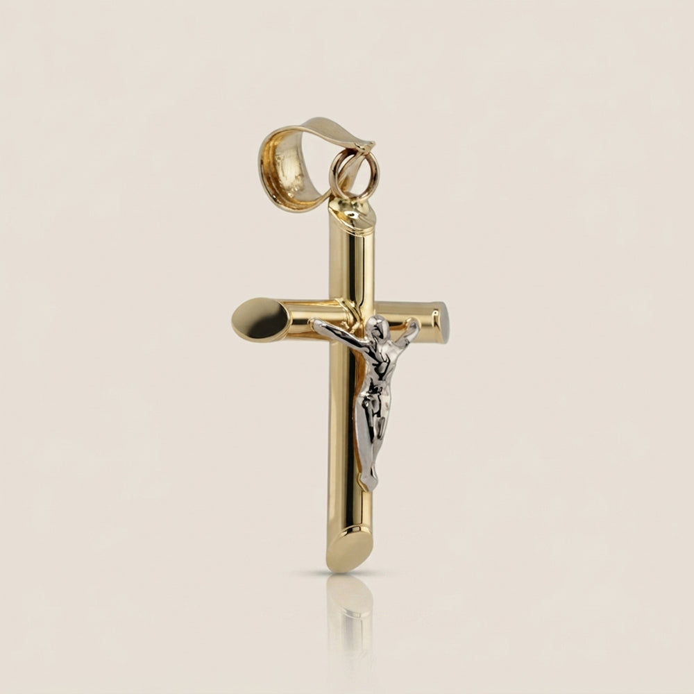 Dije Cruz Tubular con Cristo en Oro Amarillo de 14K