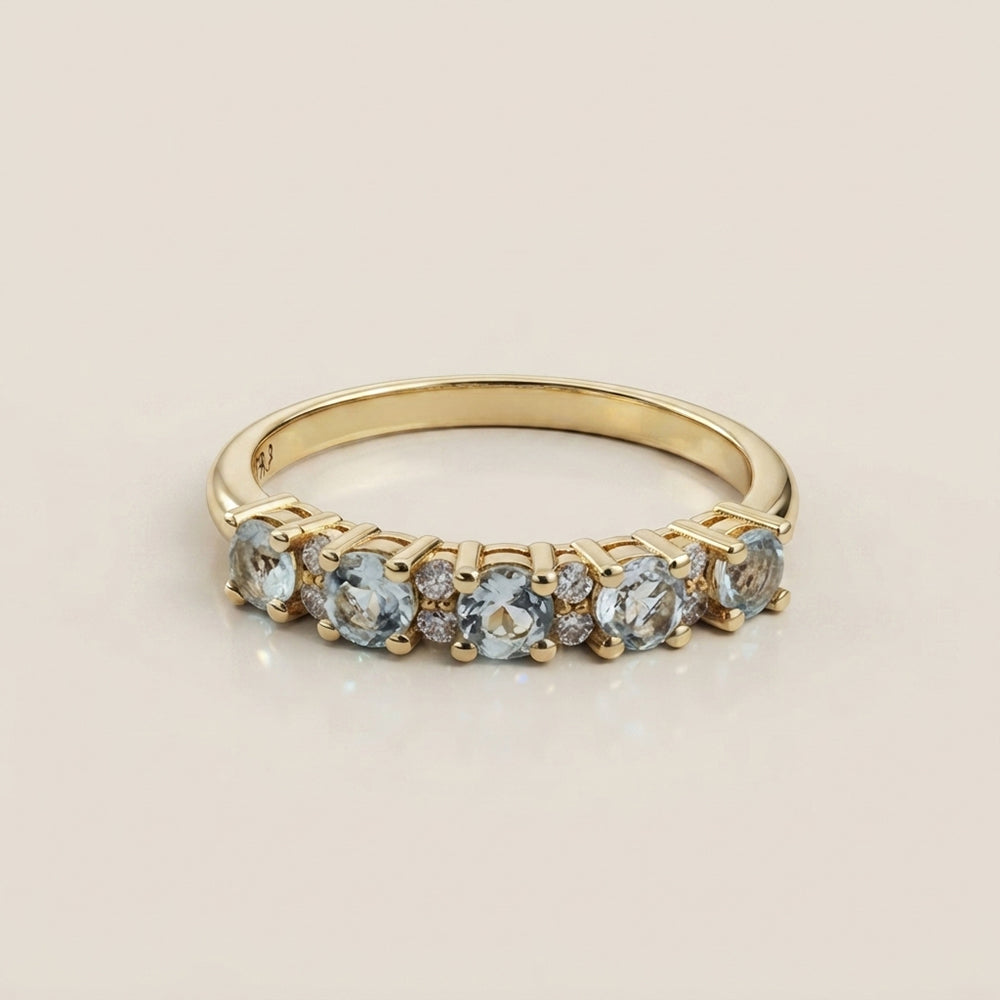 Anillo Isabel con Aquamarinas y Diamantes en Oro Amarillo de 14K