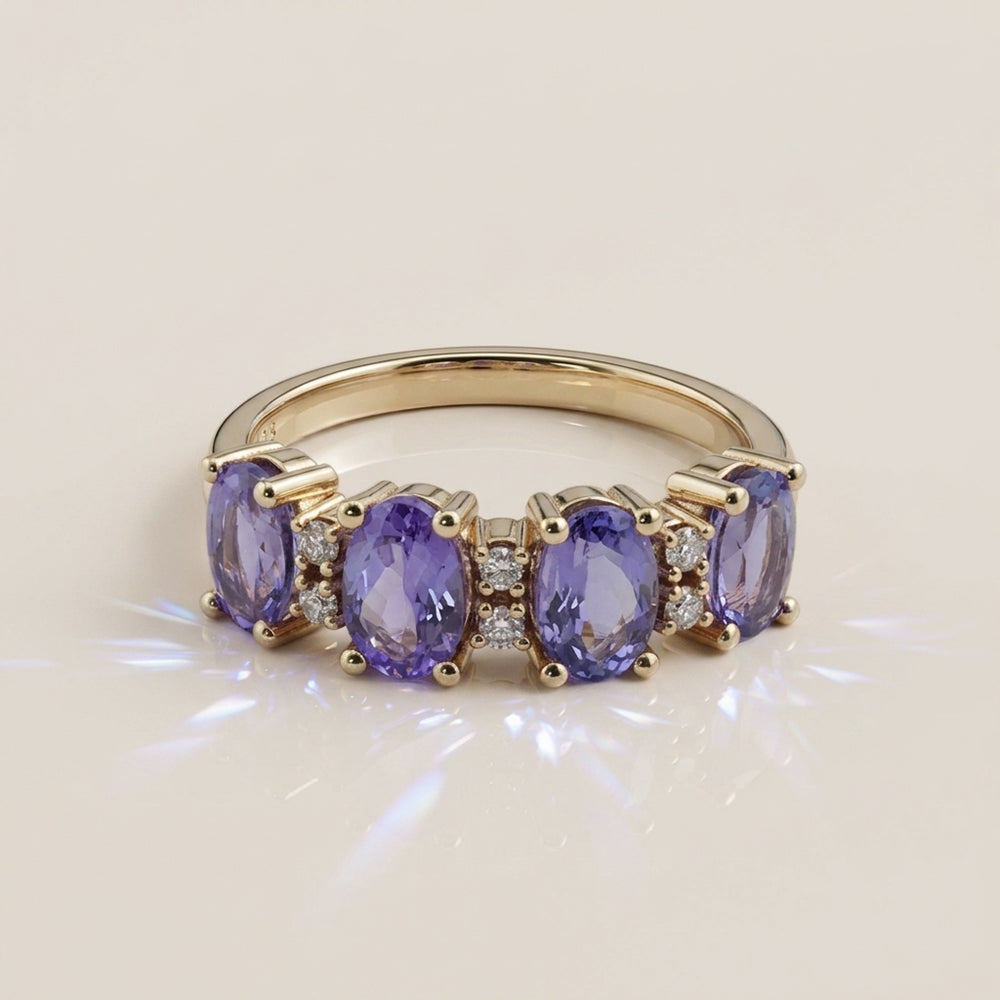 Churumbela Camila con Tanzanitas y Diamantes en Oro Amarillo de 14K