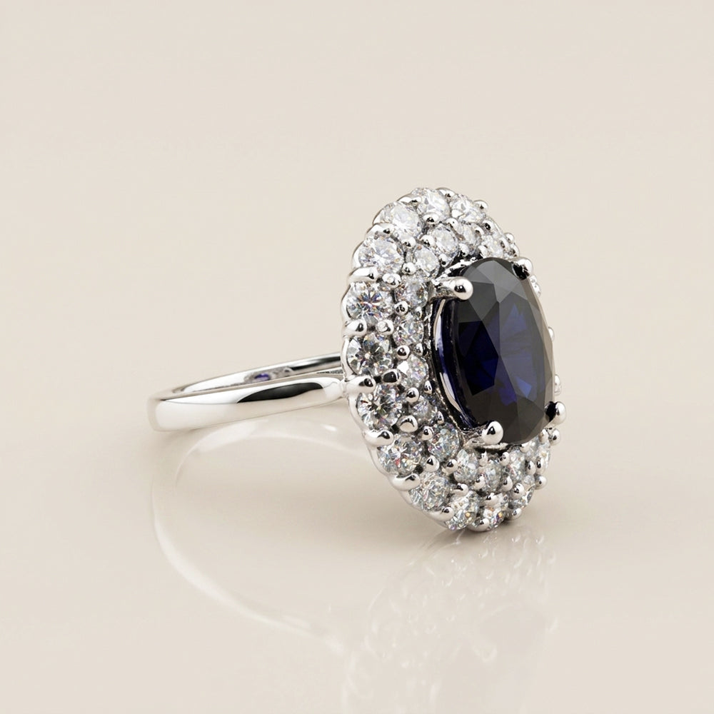 Anillo con Zafiro y Diamantes en Oro Blanco de 14K