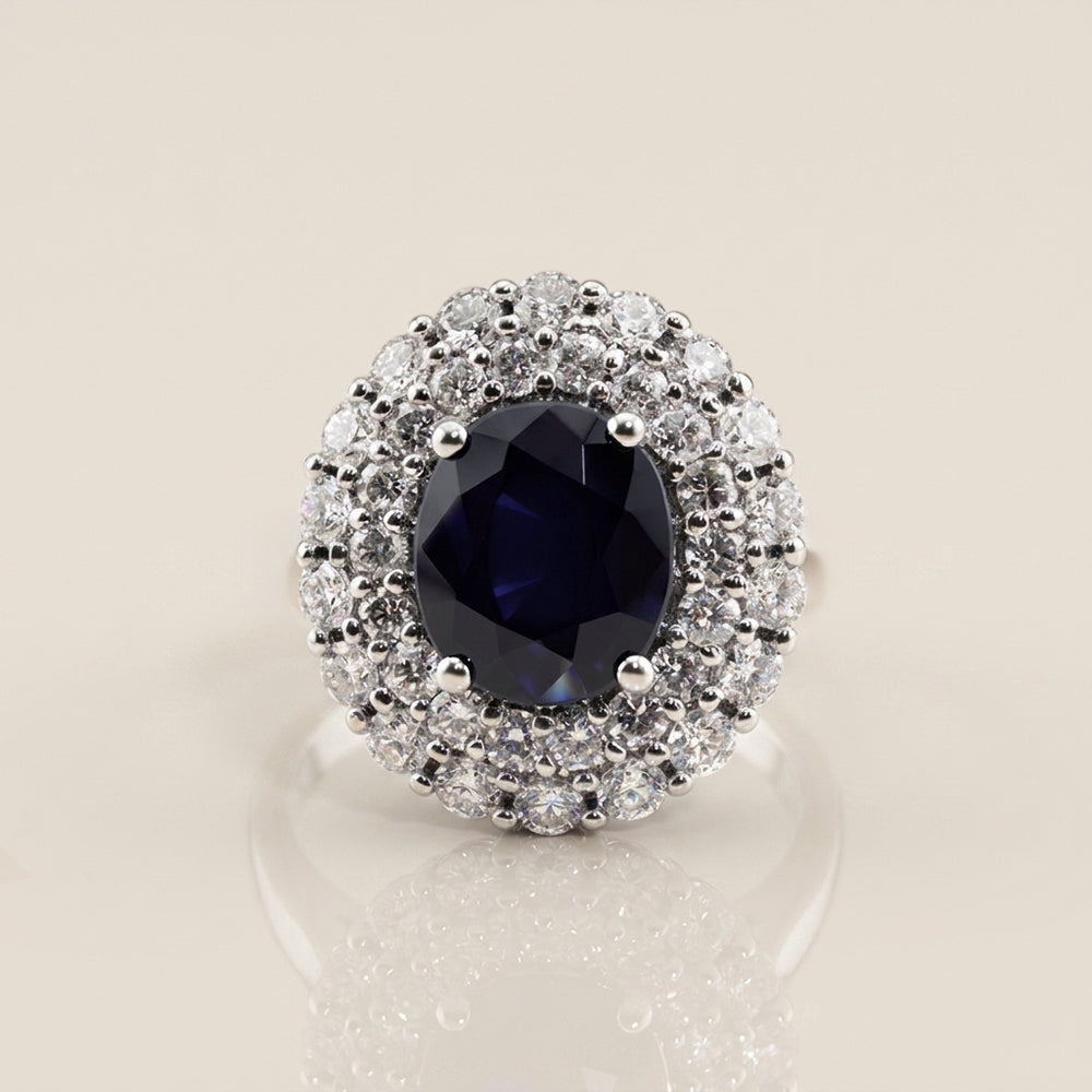 Anillo con Zafiro y Diamantes en Oro Blanco de 14K