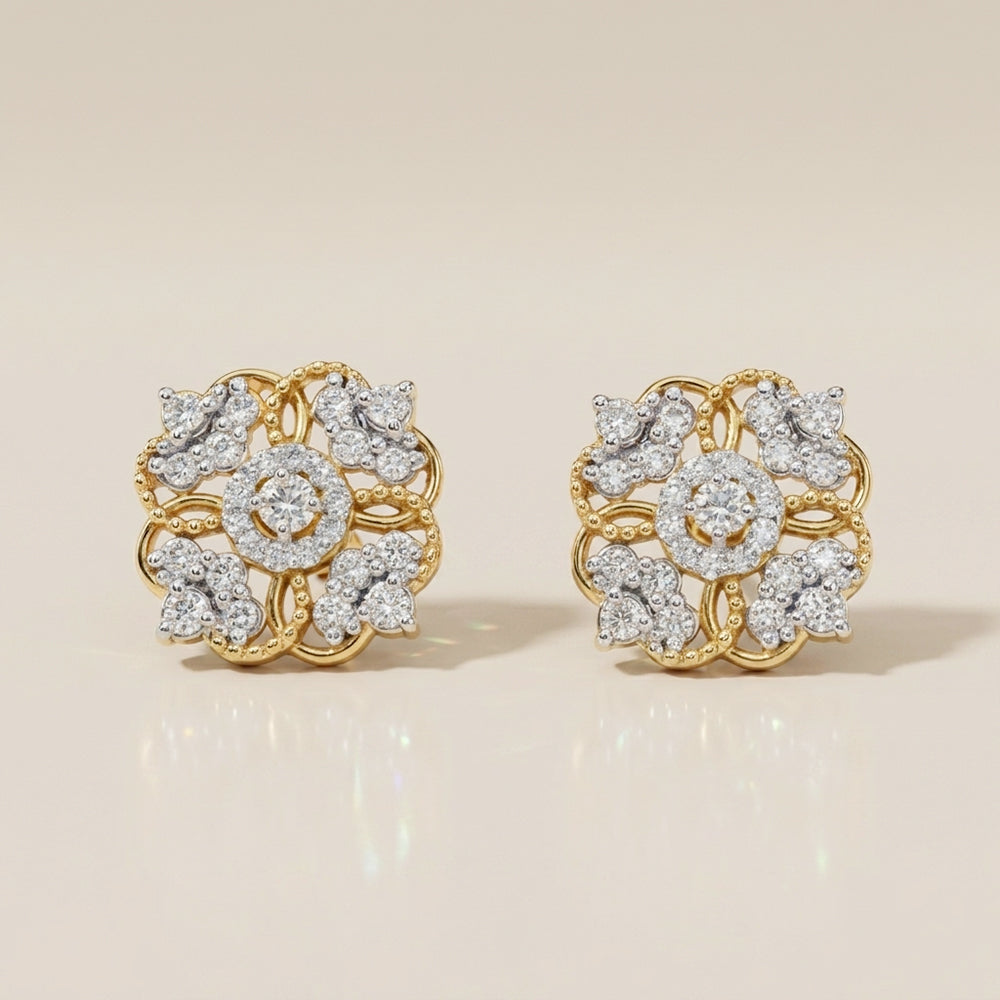 Aretes Estilo Flor con Diamantes con 0.68 CTS Total en Oro Amarillo de 14K