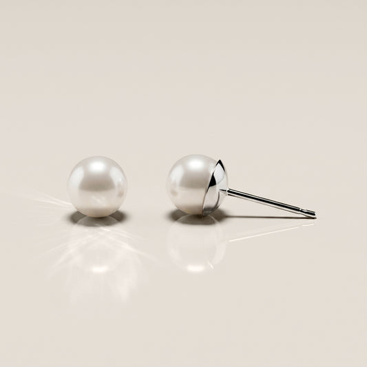 Broqueles con Perlas en Oro Blanco de 14K