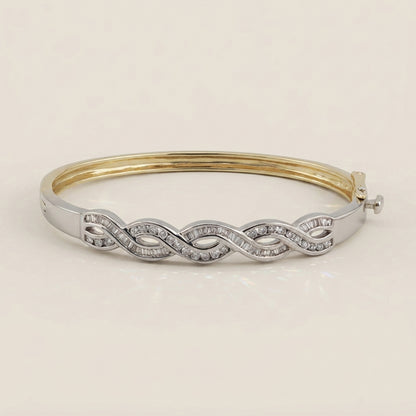 Pulsera Rígida con Diamantes en Oro Combinado Amarillo y Blanco de 14K