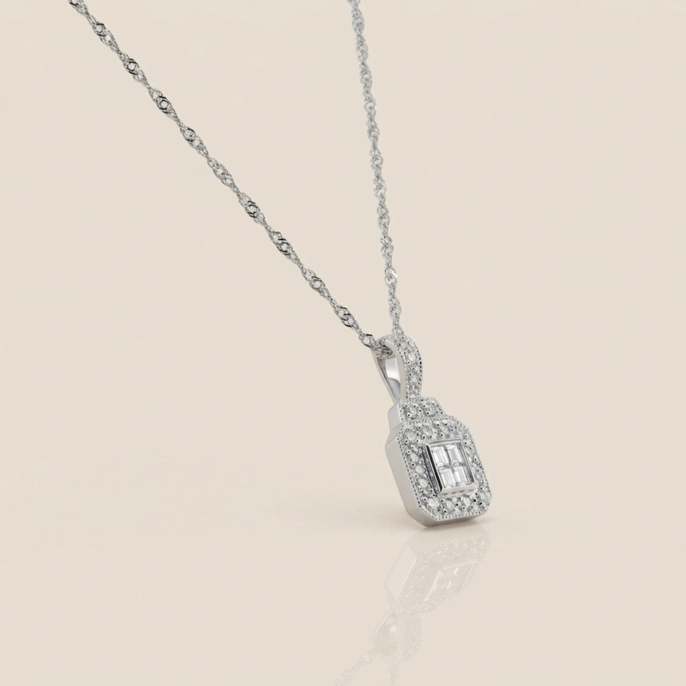 Dije con Diamantes en Oro Blanco de 14K